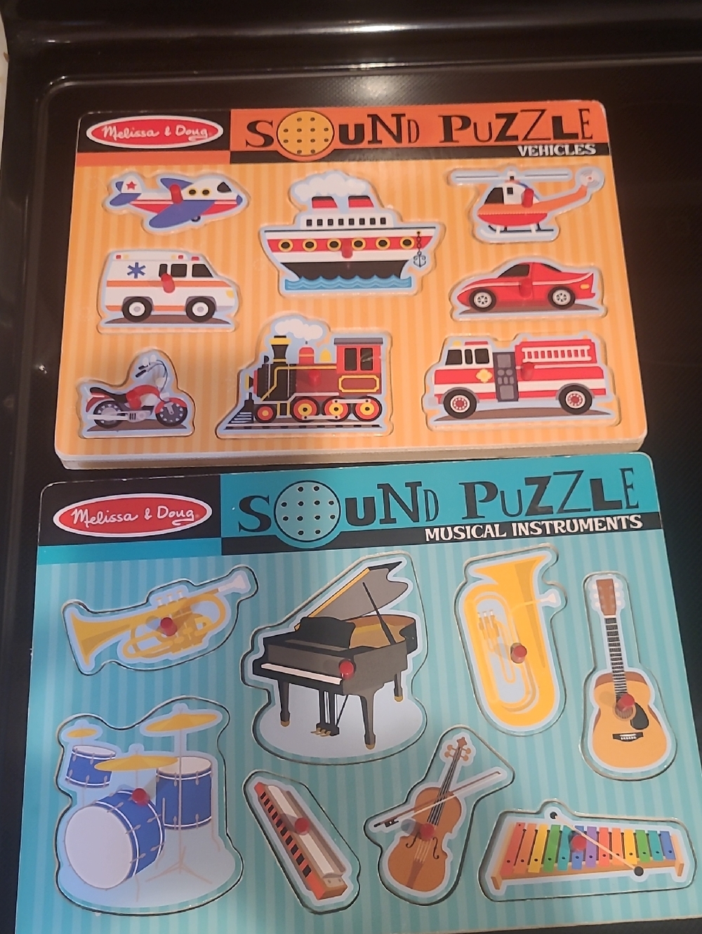 2 Melissa & Doug Vehicle and Musical Instruments Sound Puzzles